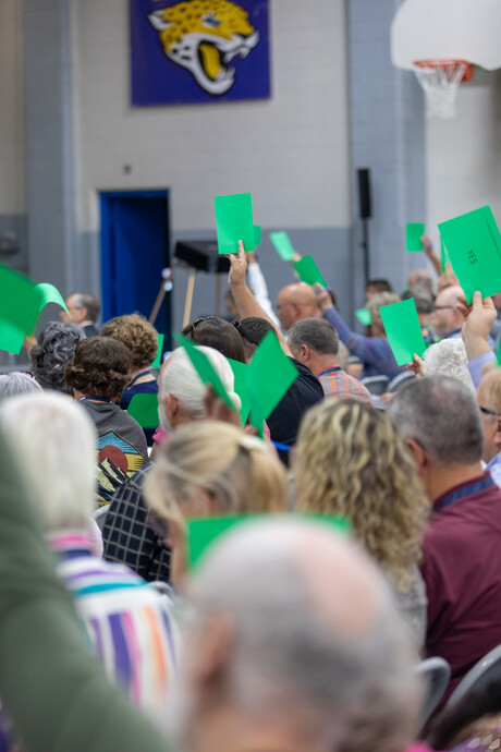 Delegates vote by rasing cards for a few inital motions during the 55th Regular Constituency Session of the Idaho Conference on Sunday, September 17, 2023, on the campus of Gem State Adventist Academy, in Caldwell, Idaho.