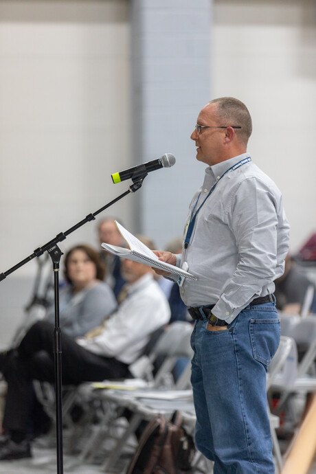 Delegates speak at the microphone to motions on the floor during the 55th Regular Constituency Session of the Idaho Conference on Sunday, September 17, 2023, on the campus of Gem State Adventist Academy, in Caldwell, Idaho.